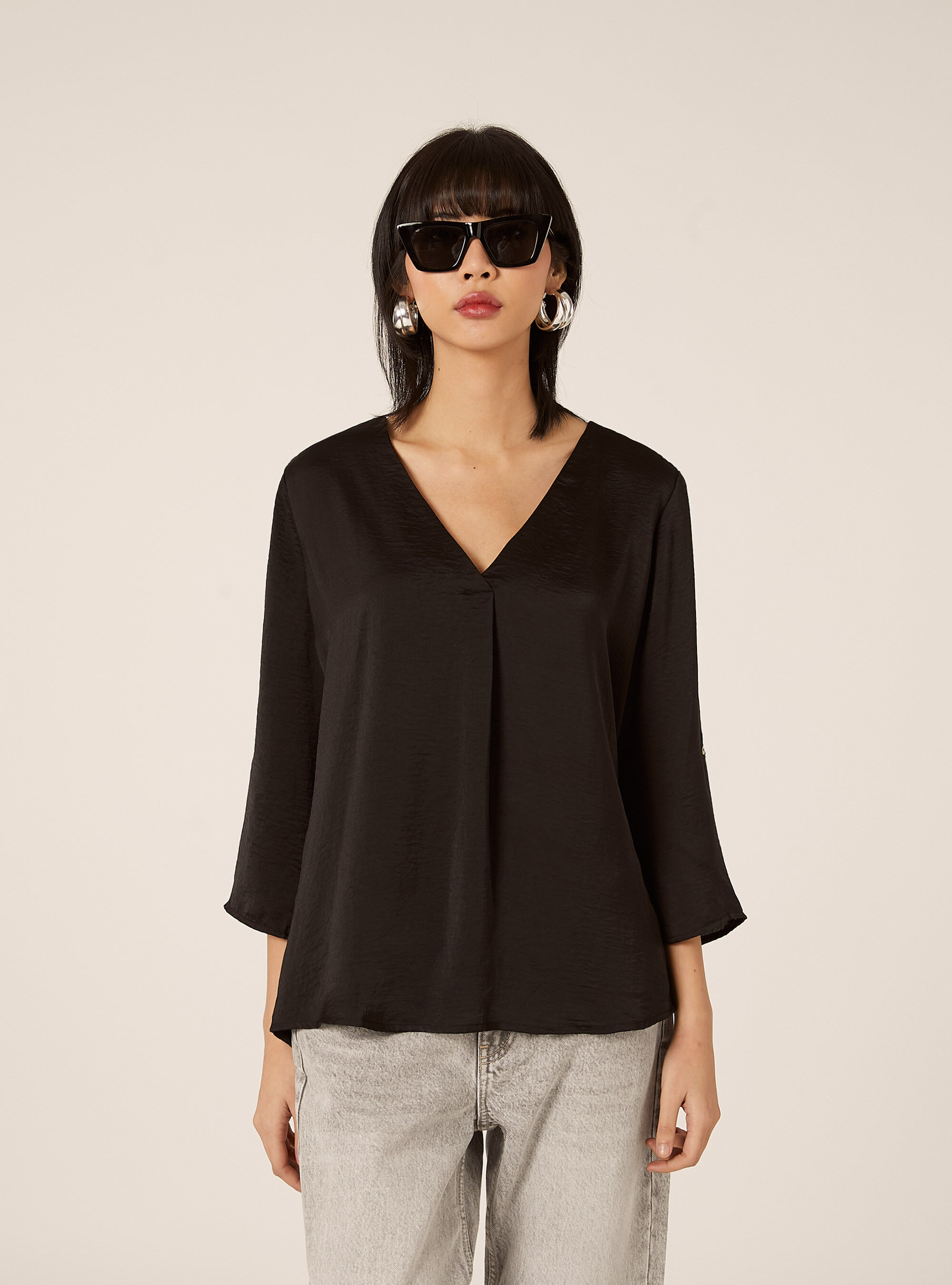 Blouse &agrave; encolure unie