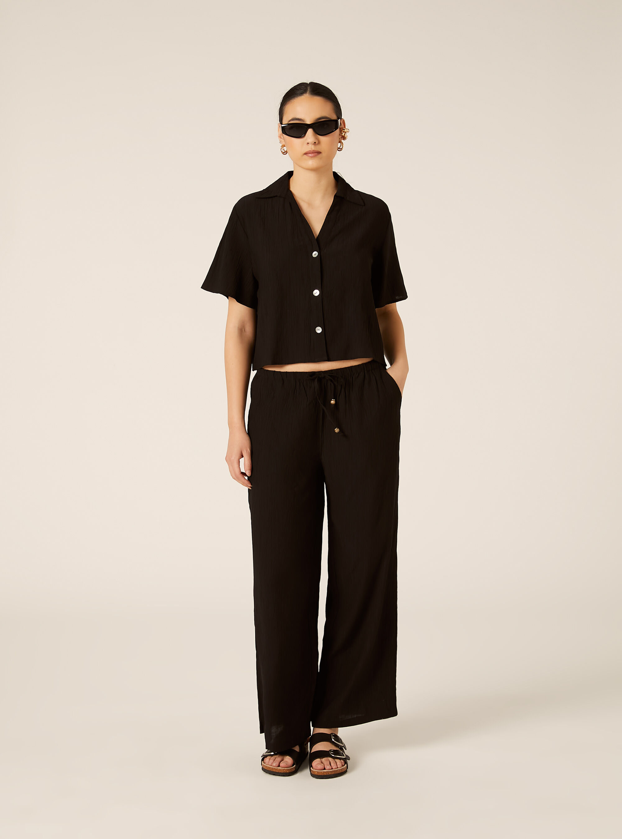 Pantaloni ampi con vita elasticizzata in crepe