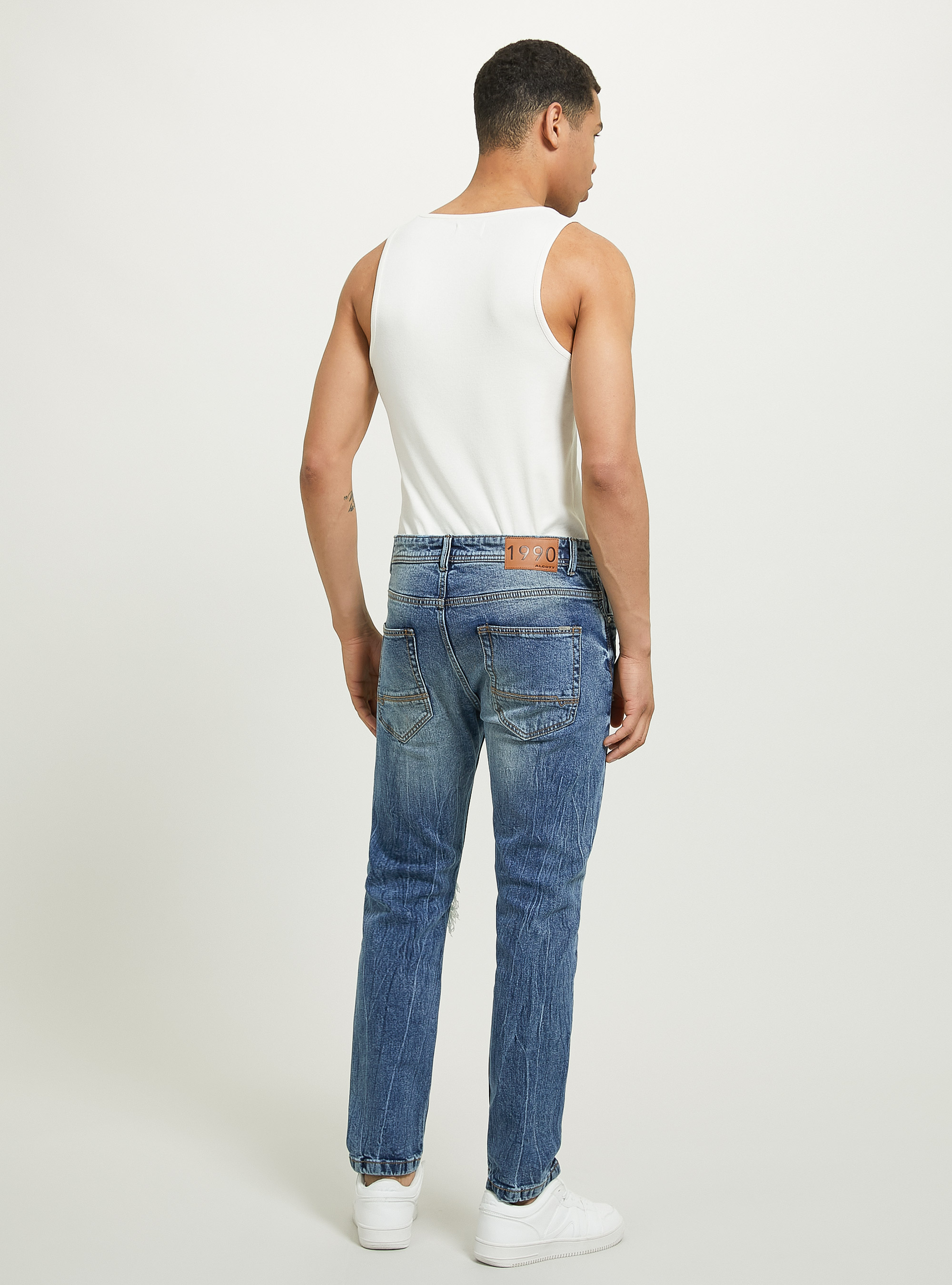 Jean slim en denim stretch avec d&eacute;chirures, D002 MEDIUM DARK BLUE